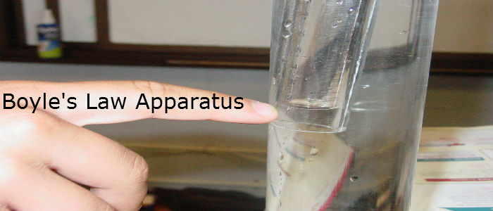 Derick Fenwick points to the Boyles Law Apparatus